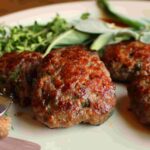 elk sausage patties on plate